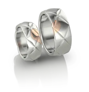Duo d'Alliances Cœur Scellé de Jocelyn Bouget : paire d'alliances en or ou argent, modélisation 3D, fonte et finition par le joaillier Laurent Barateau (Reims). Pièce d'exception sur commande.