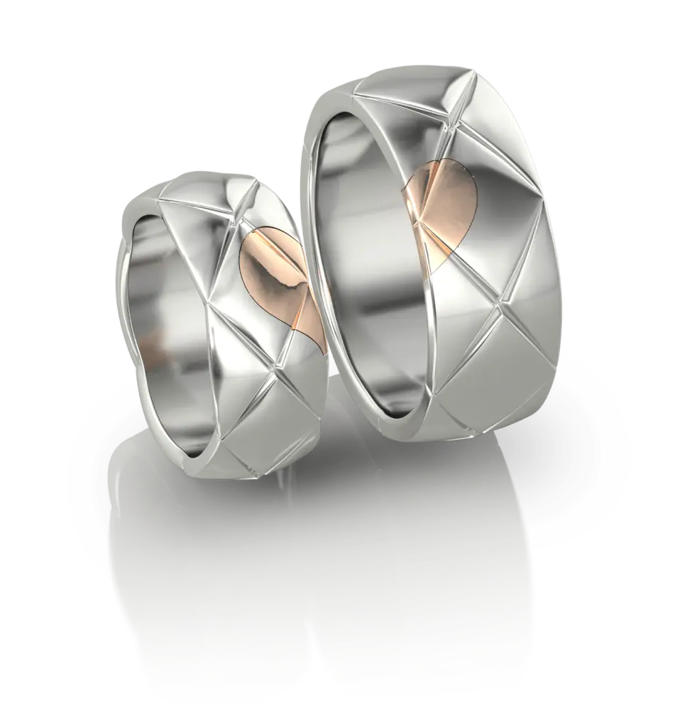 Duo d'Alliances Cœur Scellé de Jocelyn Bouget : paire d'alliances en or ou argent, modélisation 3D, fonte et finition par le joaillier Laurent Barateau (Reims). Pièce d'exception sur commande.