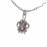 Détail macro du pendentif de 7mm : une modélisation 3D complexe imprimée en cire perdue et coulée en or blanc par Laurent Barateau.